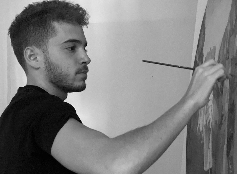 Ruben Terriza, autor del cartel, pinta en su estudio.
